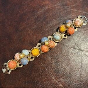 Dogtooth gum drop confetti’s collectible chunky statement high end bracelet